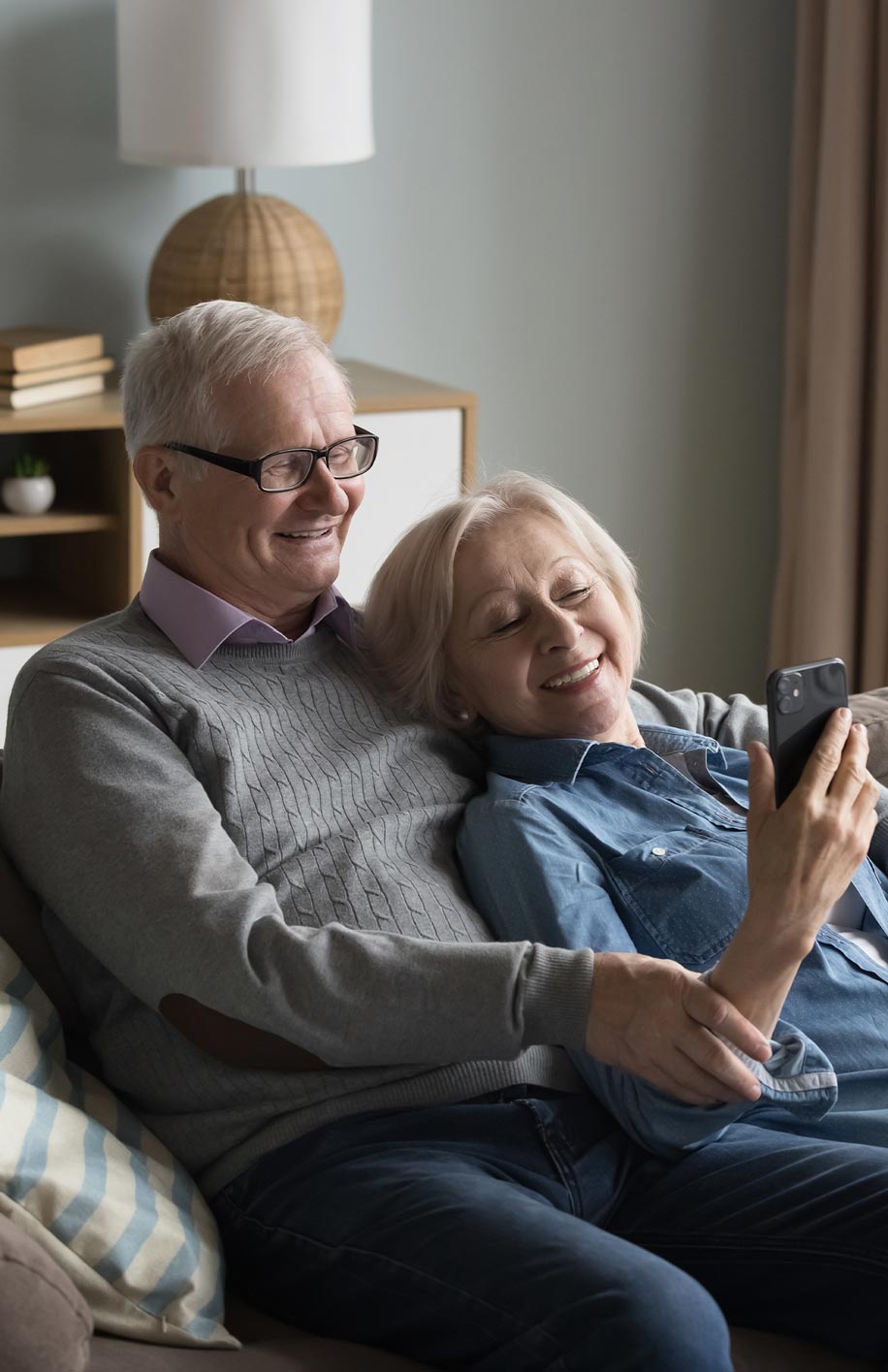 A couple of older adults chill using SOFI app